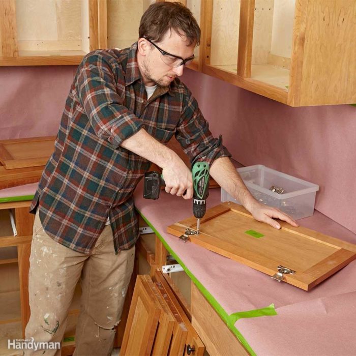 Do you have to strip cabinets before staining