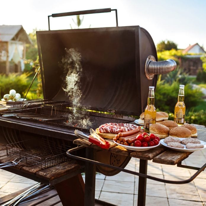 12 Tips for Planning the Ultimate Backyard Barbecue - DFH17MAY049 Shutterstock 591209330 696x696