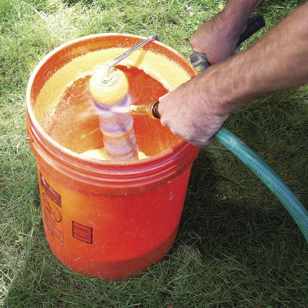 sand bucket with water hose