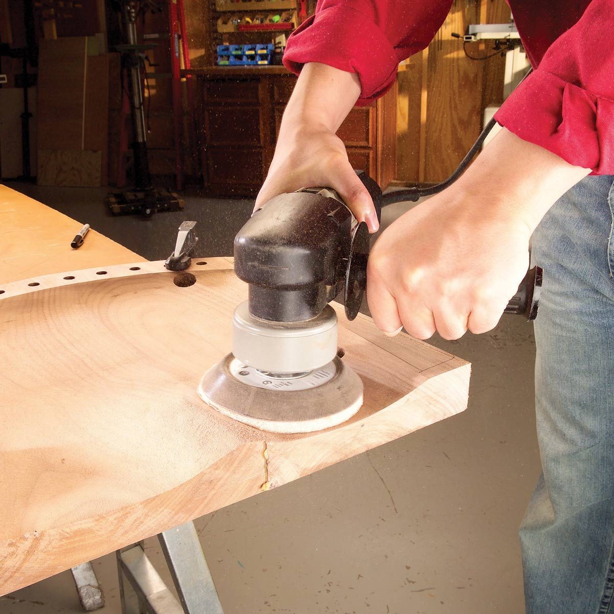 Carving Minicell foam seat with a grinder and sander