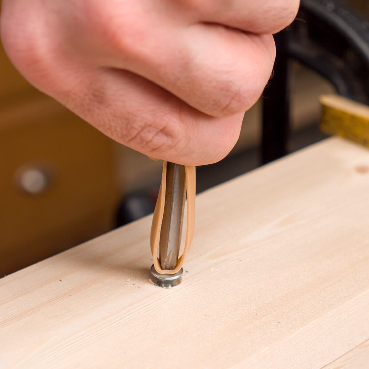 Use a Rubber Band to Grip Stripped Screws