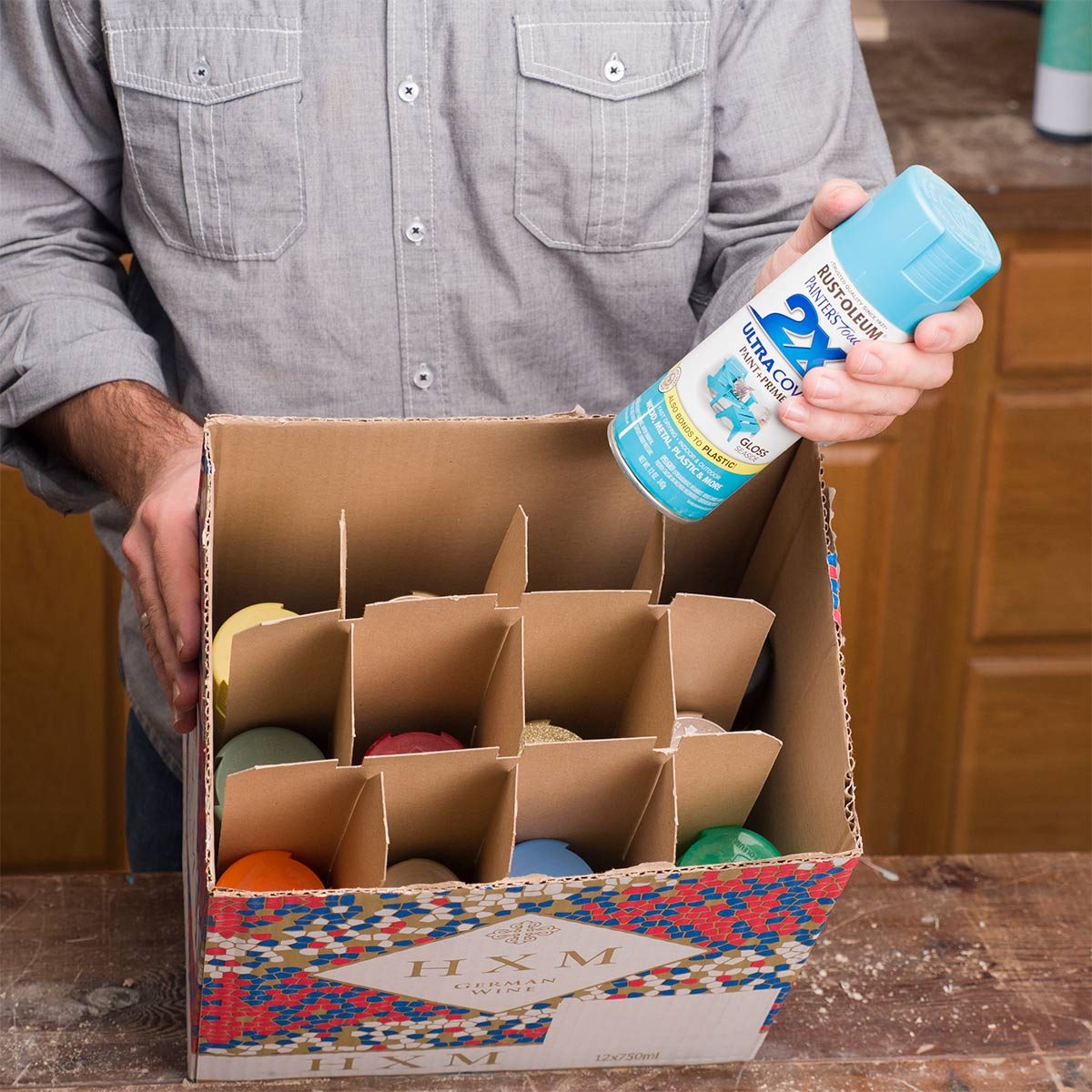 storing spray paint in a wine box