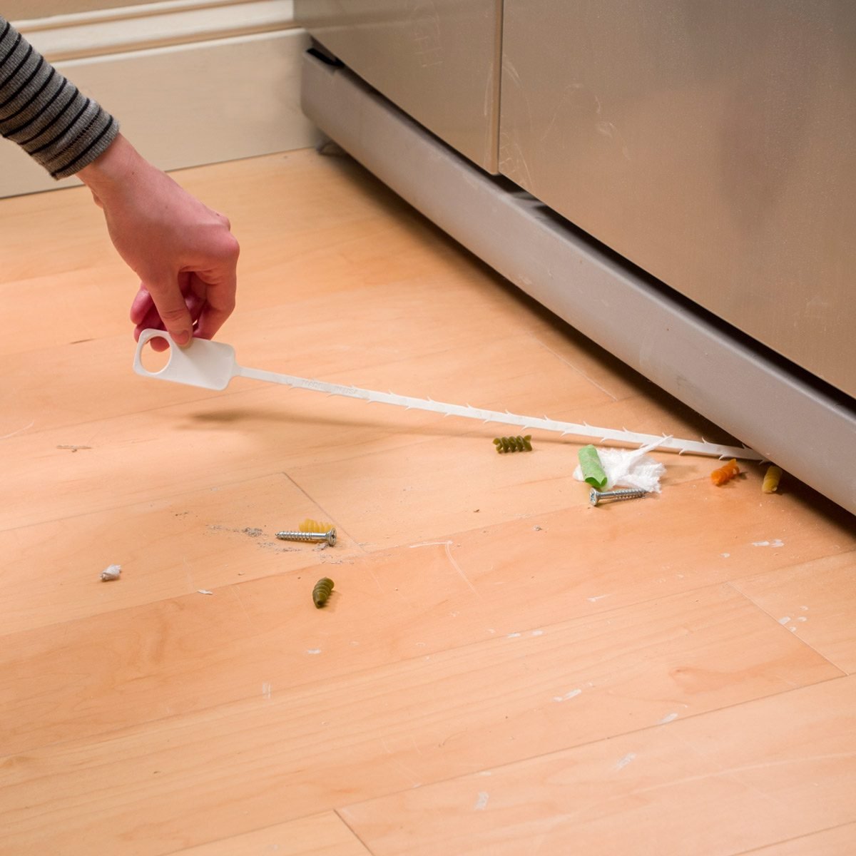 How to Clean Under Your Fridge