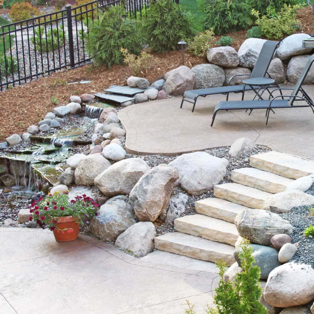 Multi-level patio designs with water feature