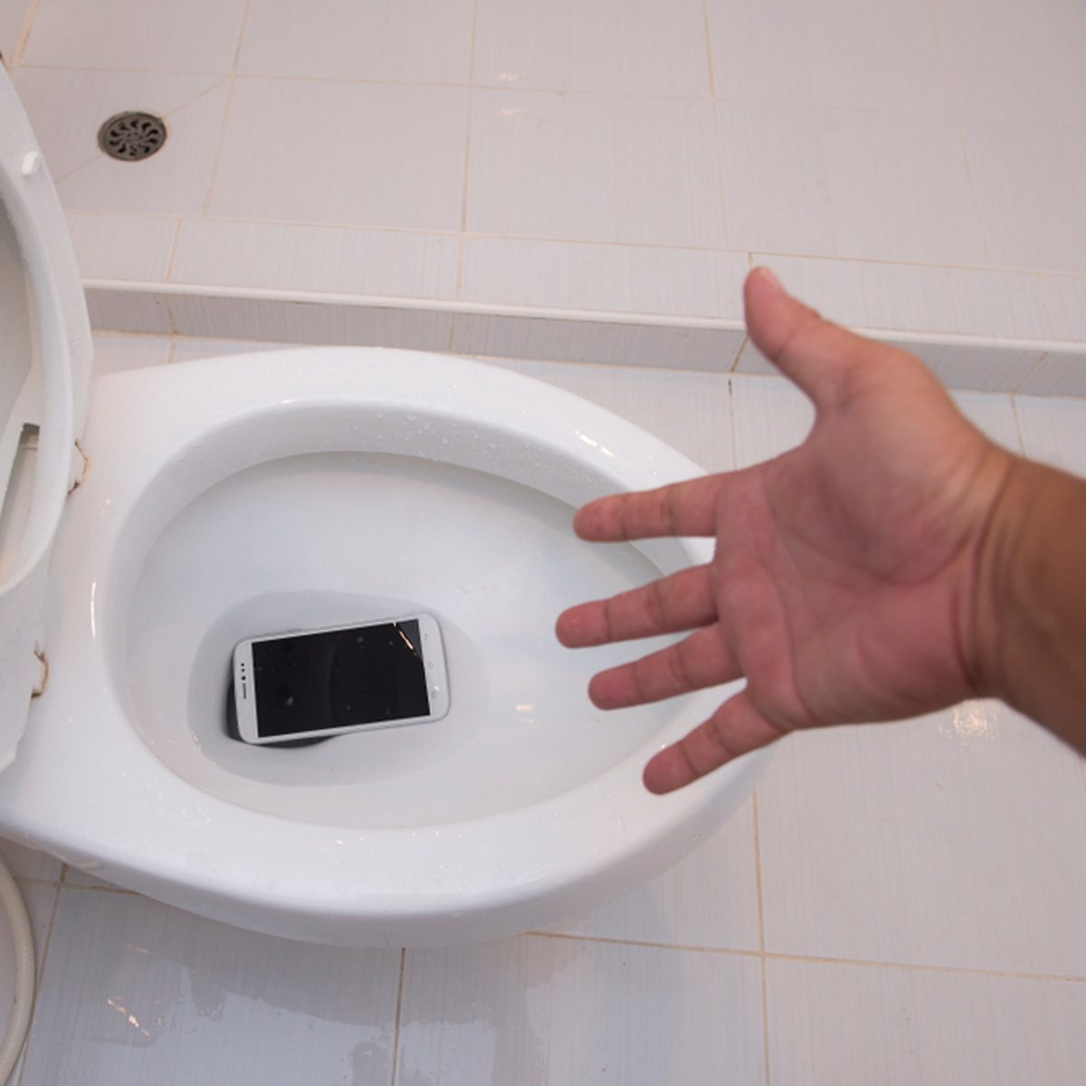 Dropped Phone in Toilet? Here's What to Do If Phone Falls in Water