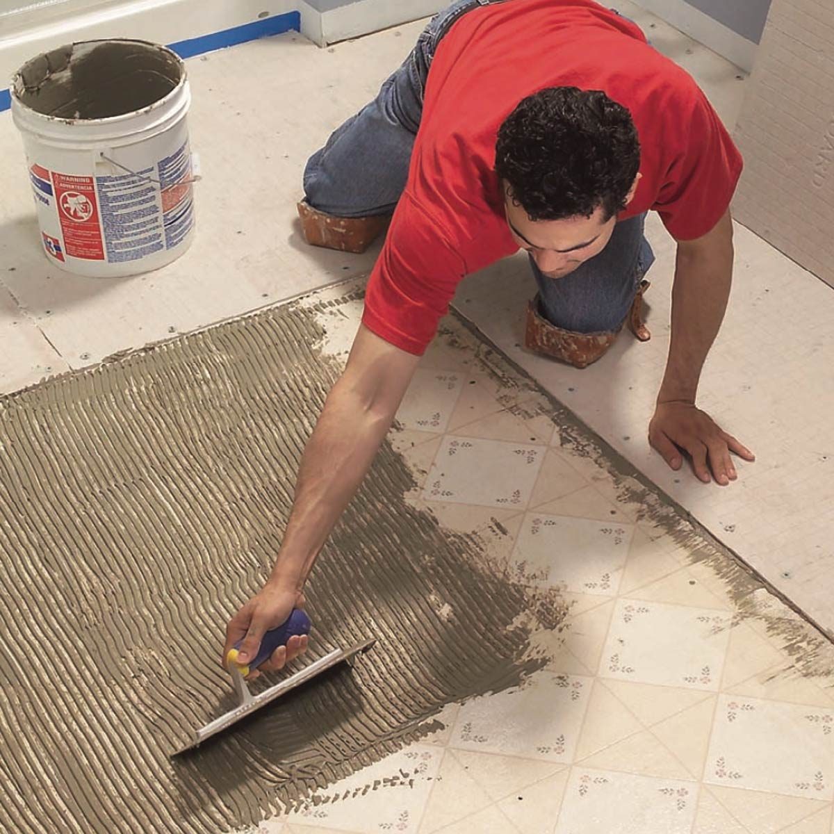 How To Lay Tile Install A Ceramic Tile Floor In The Bathroom