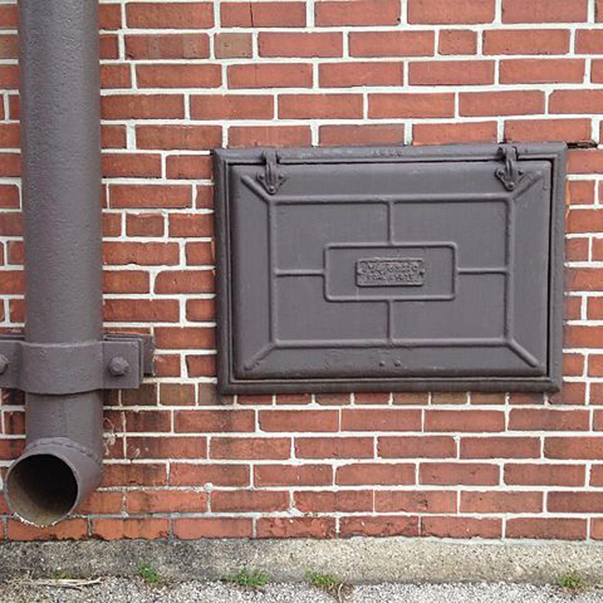 Why Old Homes Have a Tiny Iron Door Leading to the Basement