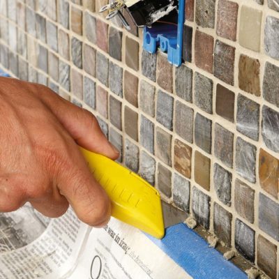 familyhandyman caulk scrape grout