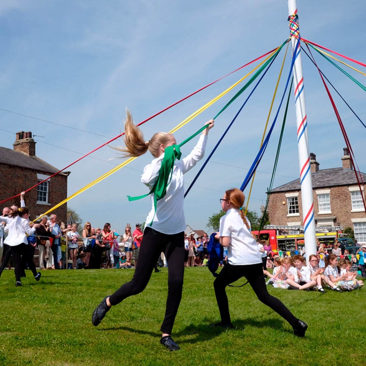 What is a Maypole and Why Do People Dance Around It?