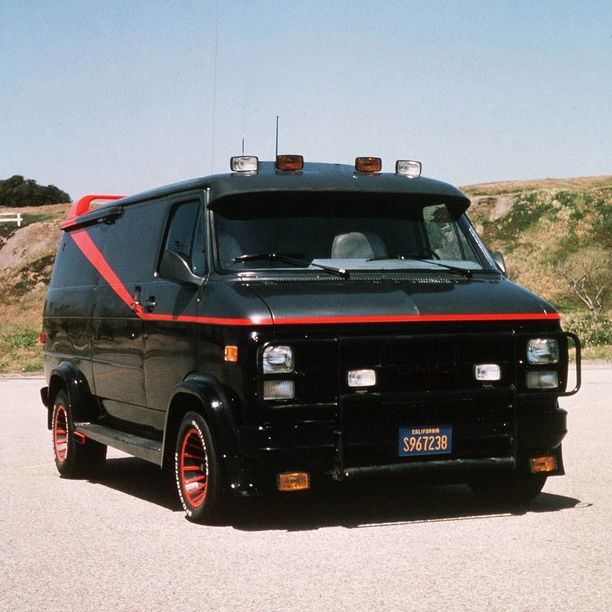 black van with red stripe