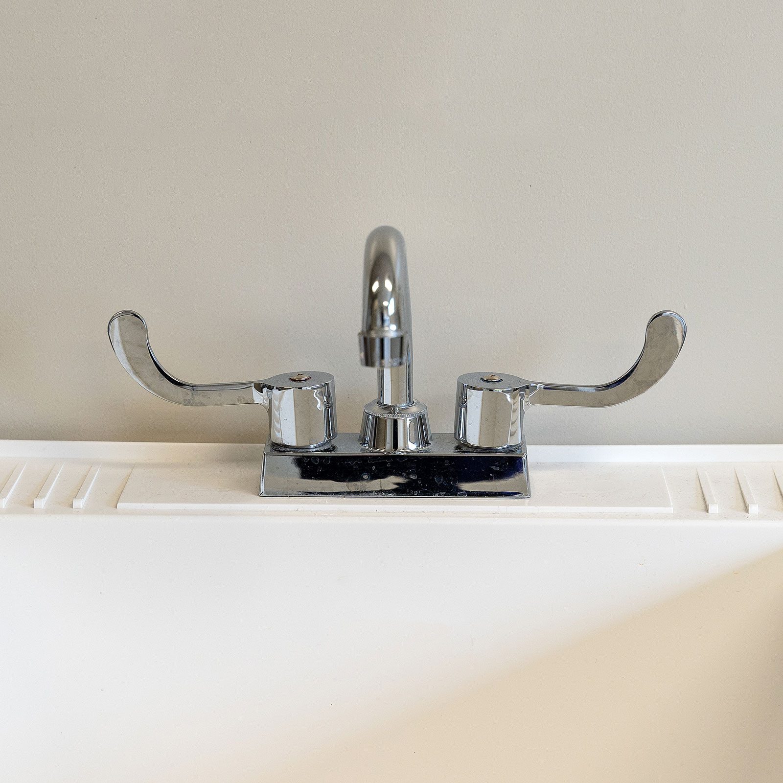 How To Fix a Leaking Faucet in the Laundry Room