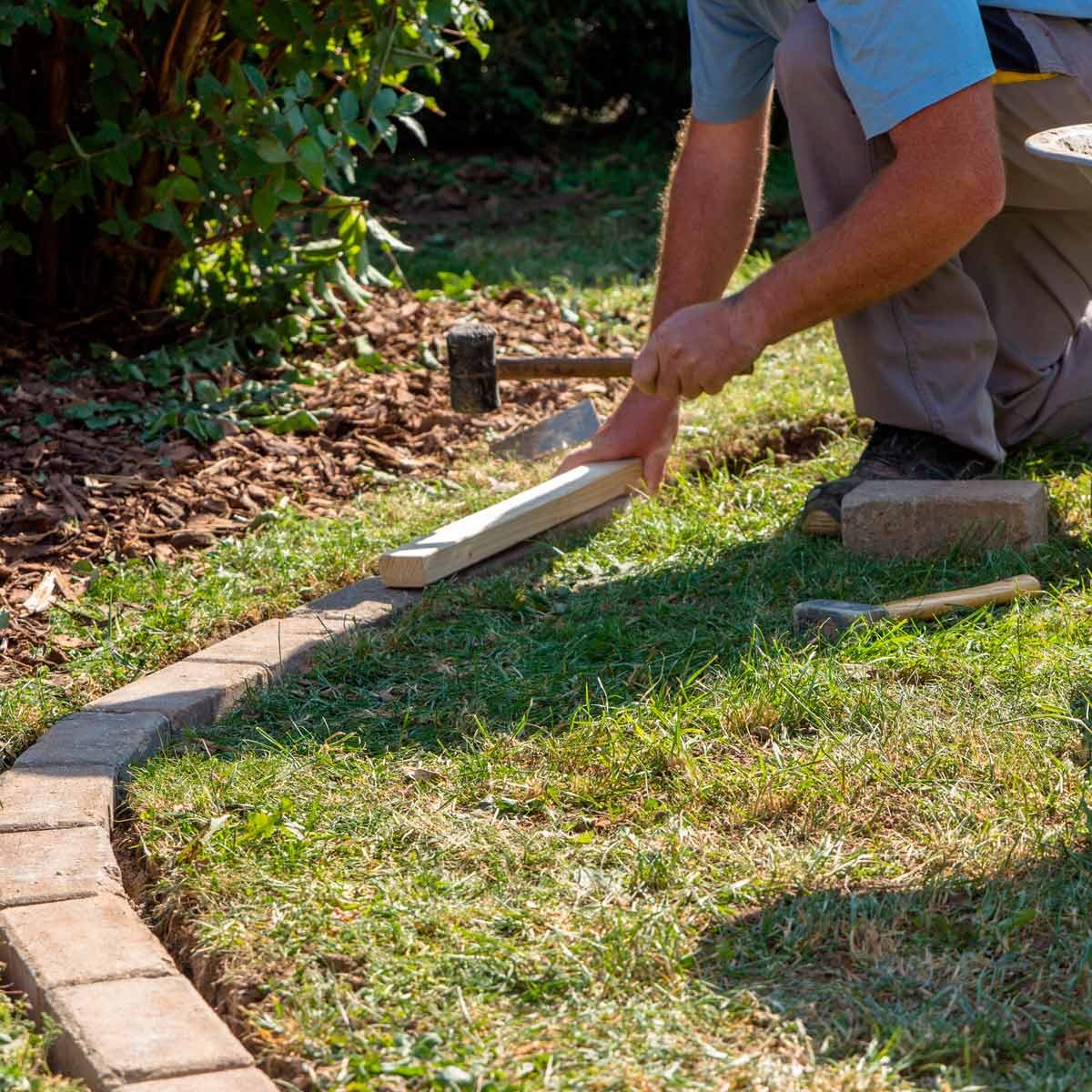 How To Install Concrete Flower Bed Edging Family Handyman