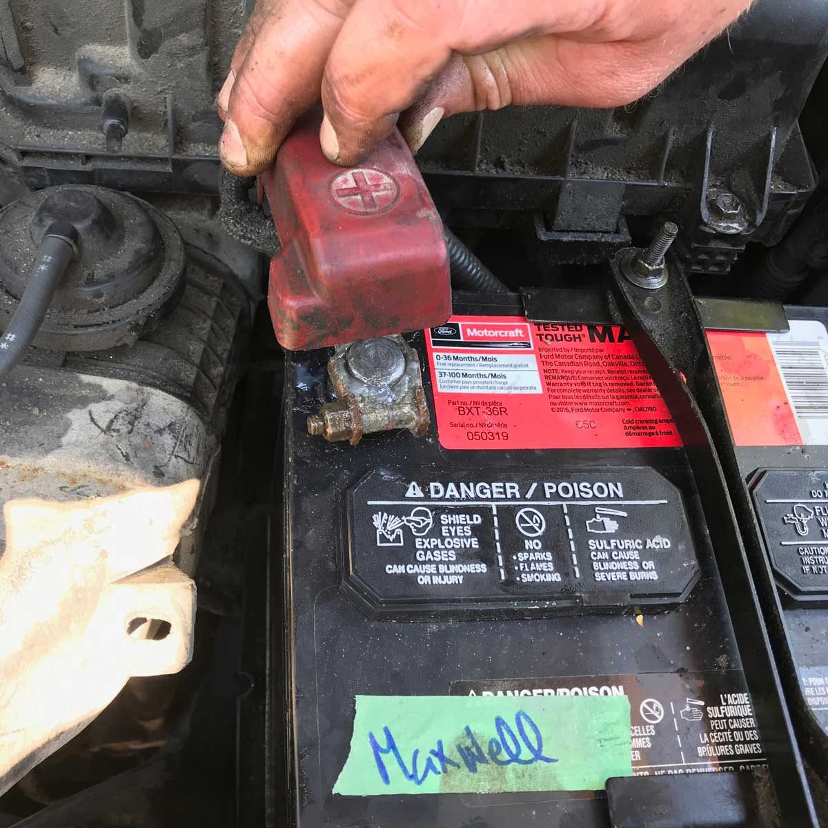 car battery leaking from caps