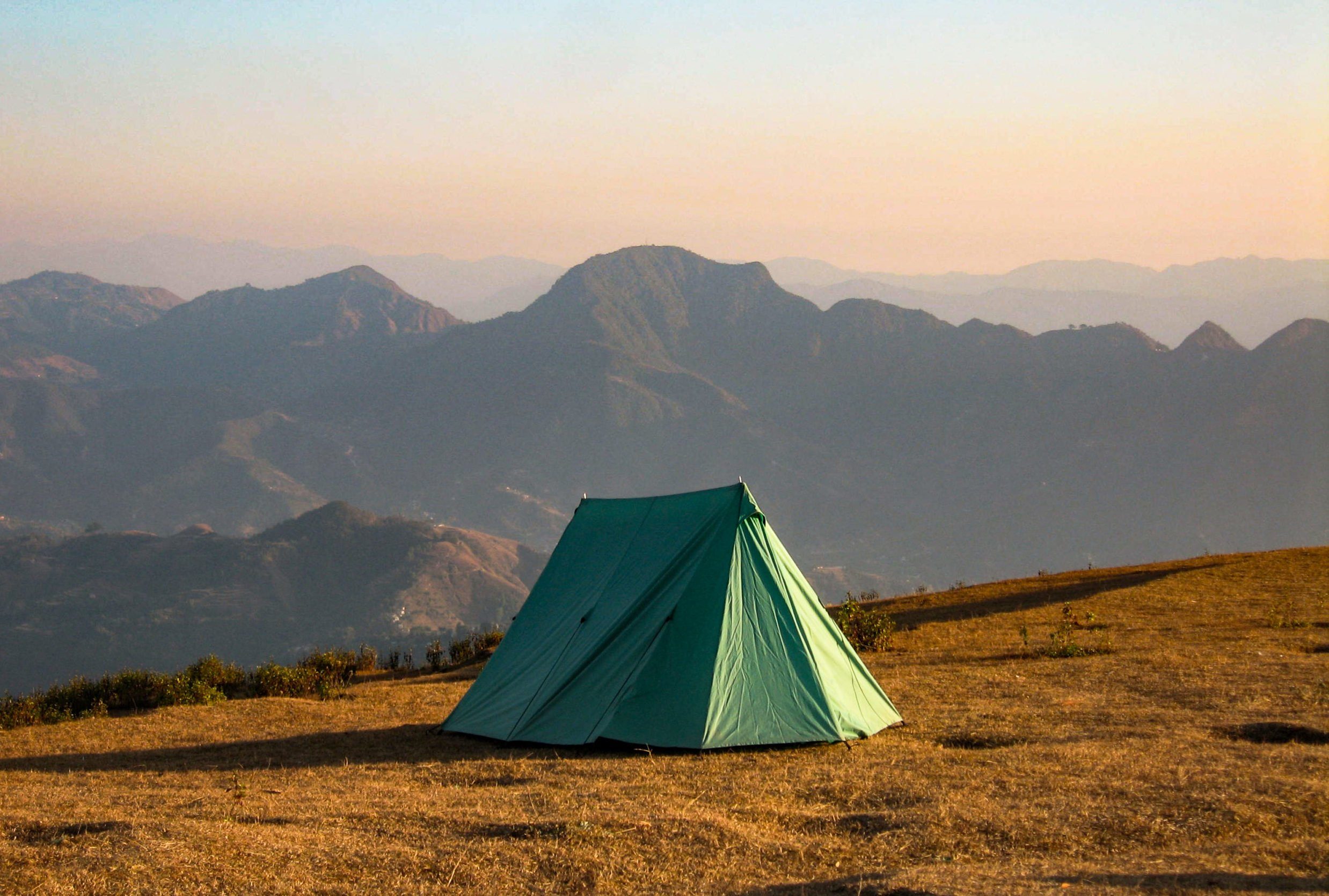 Camping above the hills in the the with the aerial view. Sirkot, Sworek, Syangja, Nepal. Amazing paragliding spot.