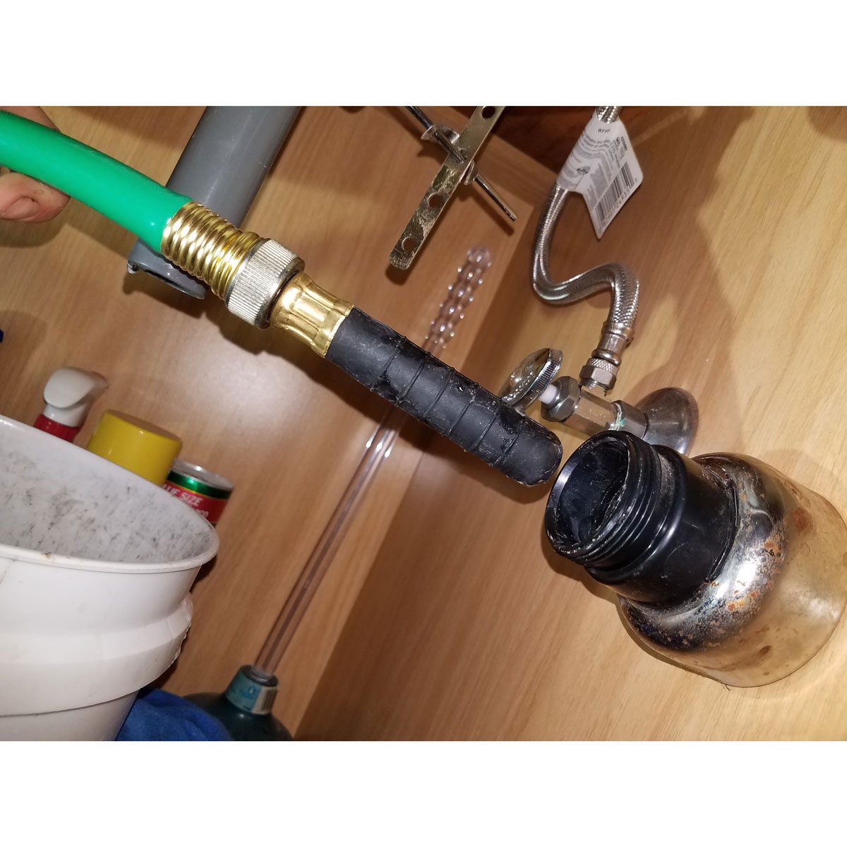 How to Use A Drain Bladder to Blast Any Clog (DIY) Family Handyman