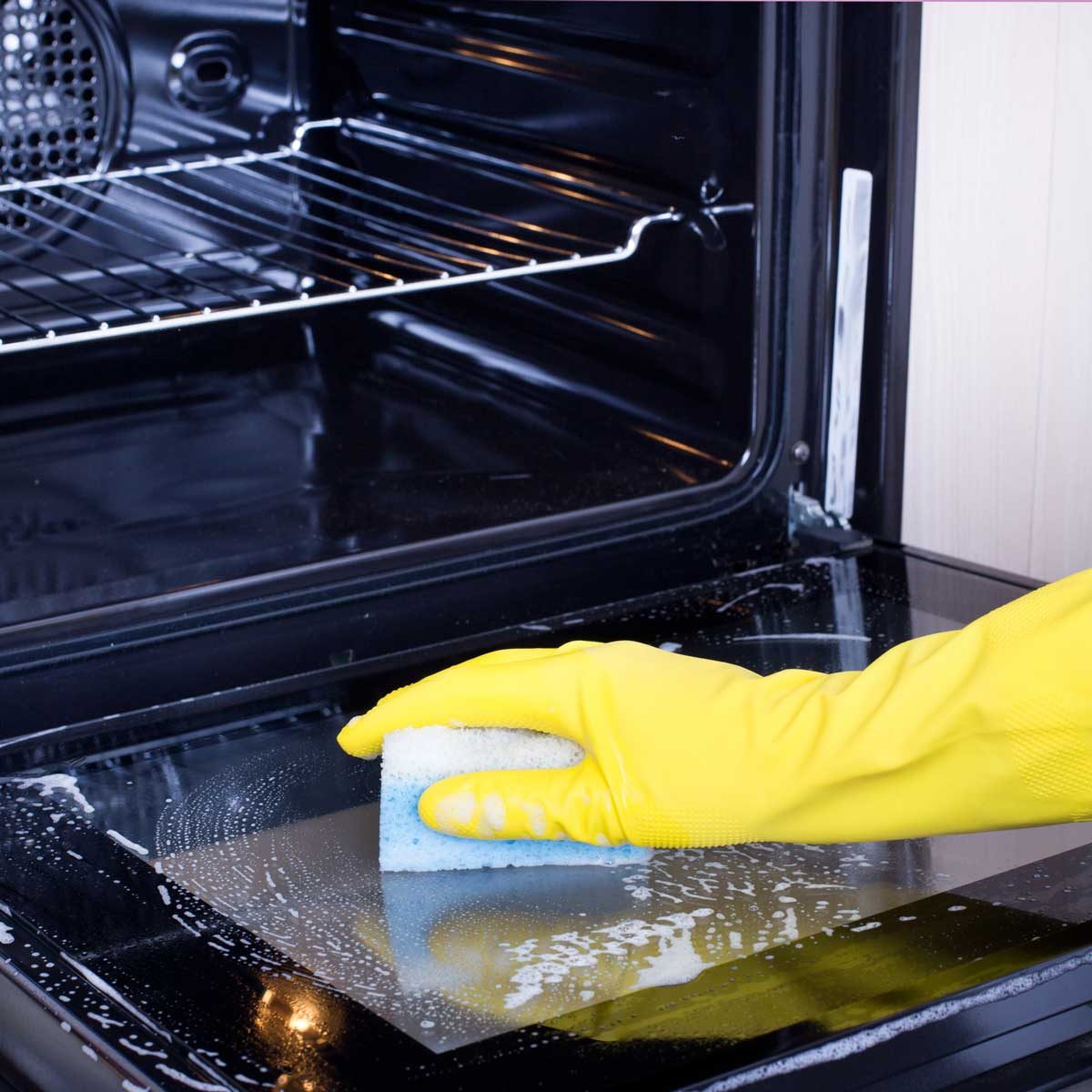 Cleaning Oven GettyImages 517797998 