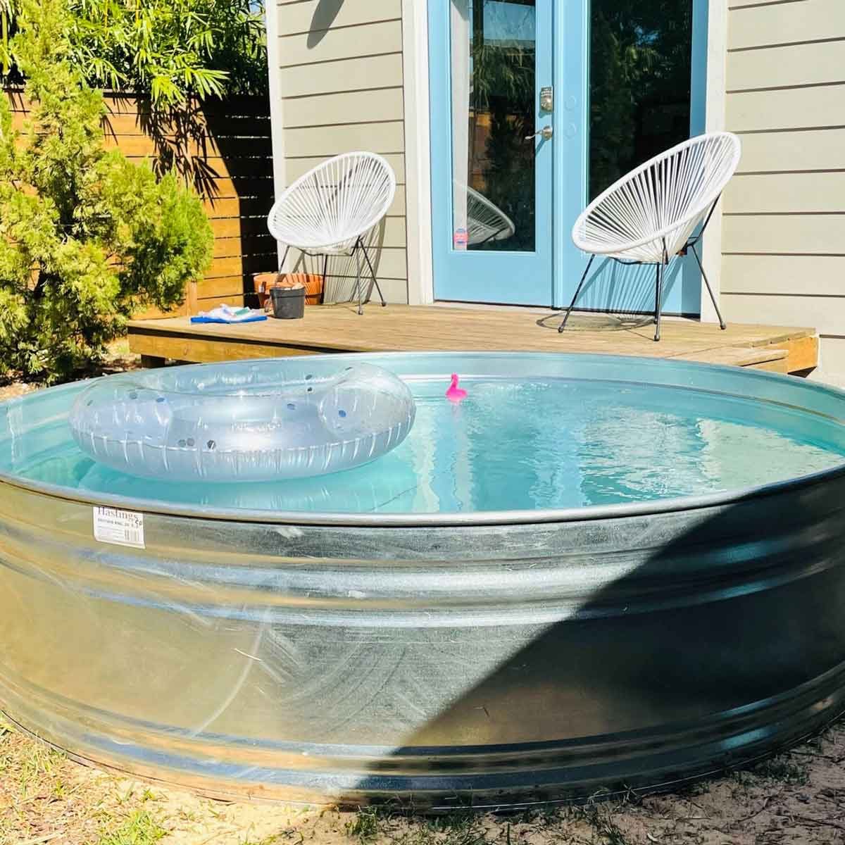How We Made A Metal Stock Tank Into Our Bath Tub 