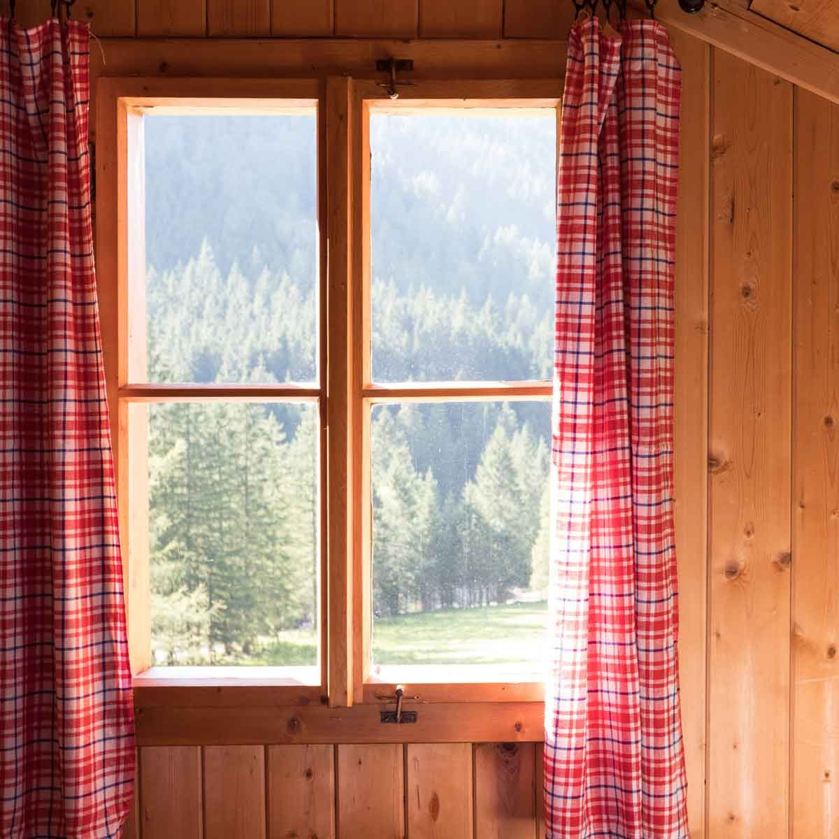 Plaid Cabin Window Treatments GettyImages 1151399472 