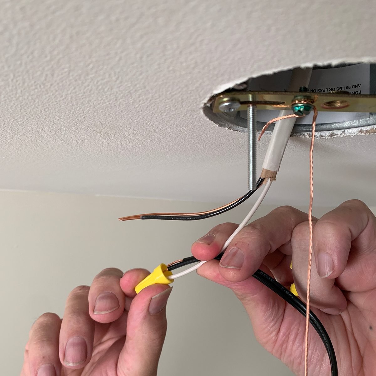How do I disconnect these type of wires from ceiling lamp? Clear