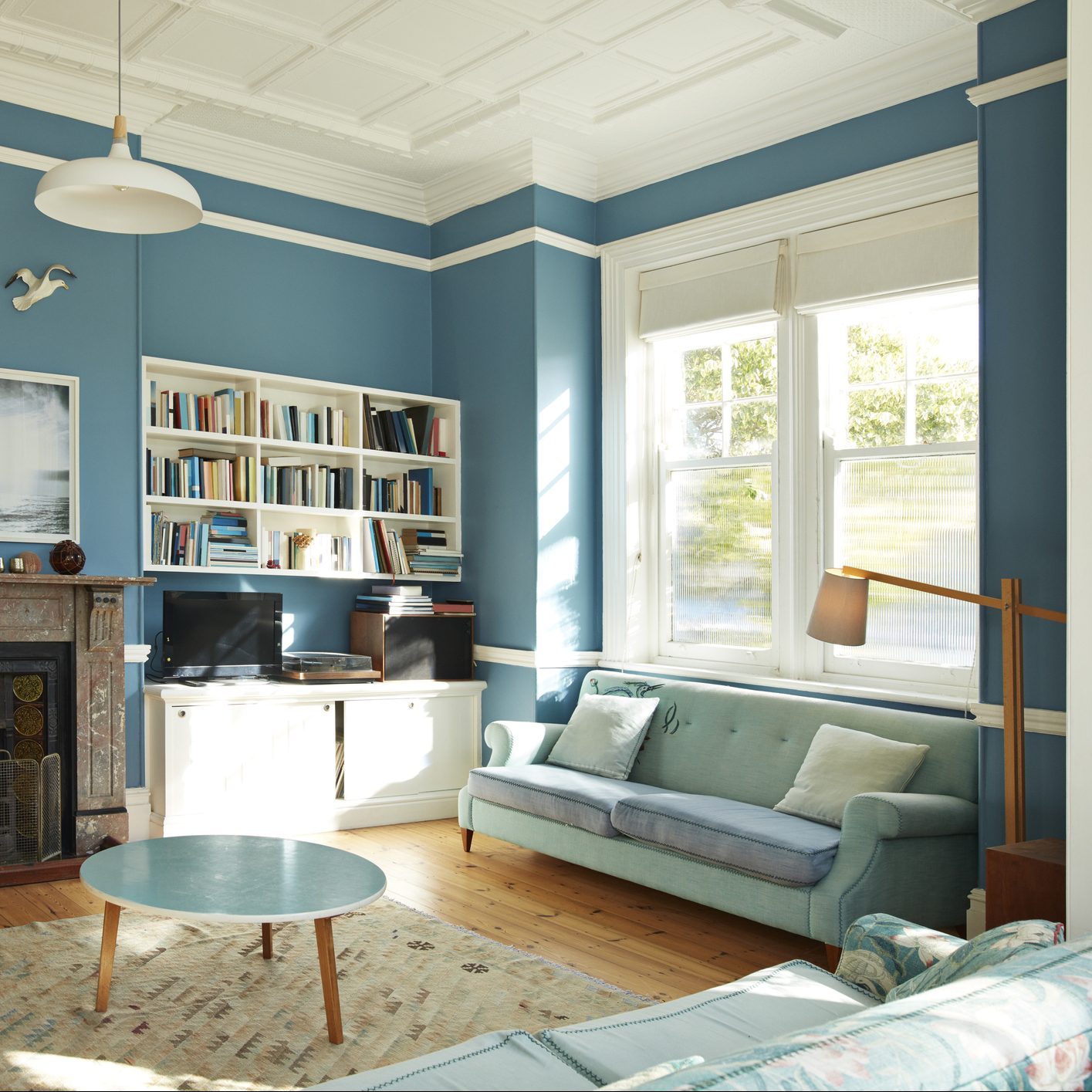 living room with Aligned Interior Window Trim with Picture and Chair Rails