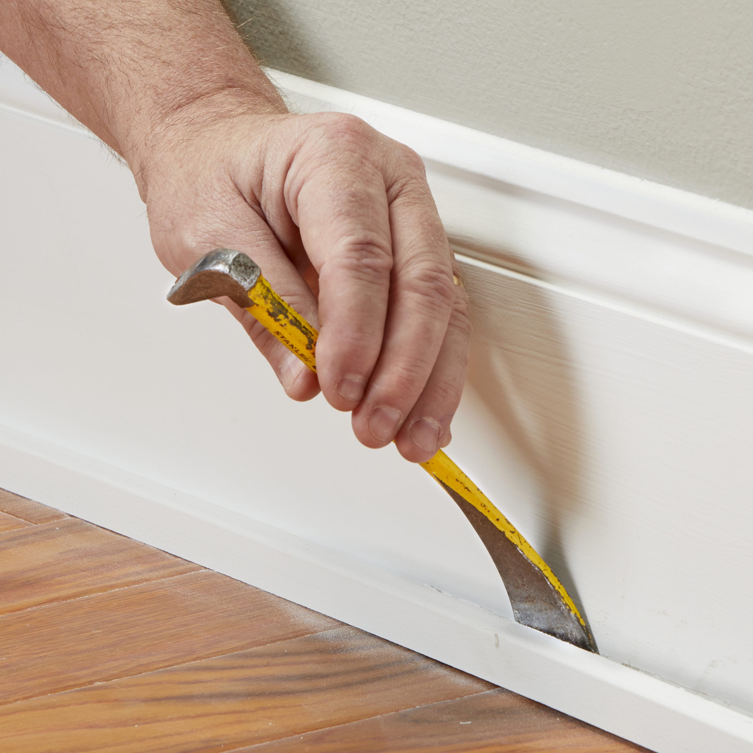 STOP USING A PRYBAR TO REMOVE BASEBOARDS. Instead, get a trim puller. , Base Boards