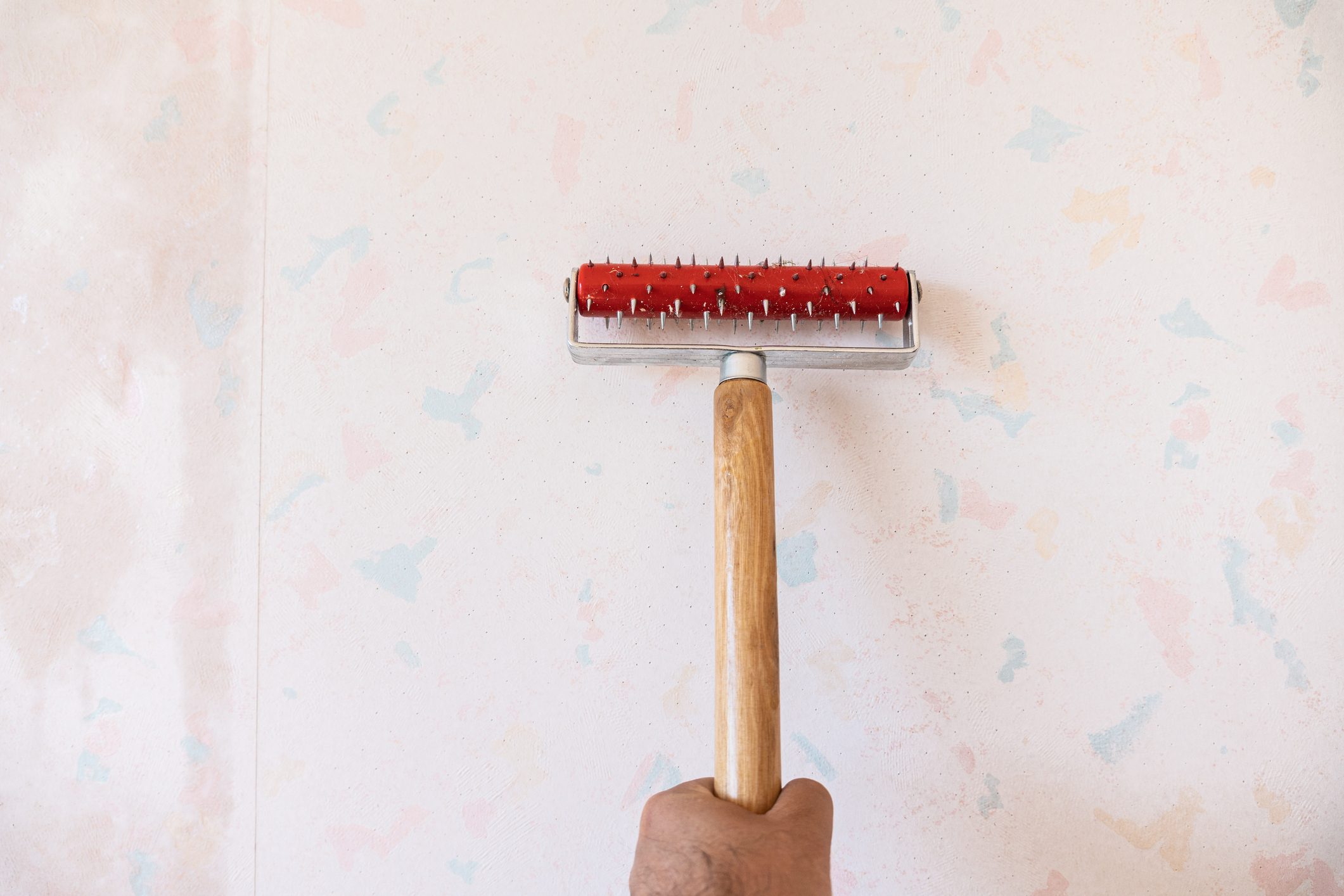 using a string tool to remove outdated and faded wallpaper