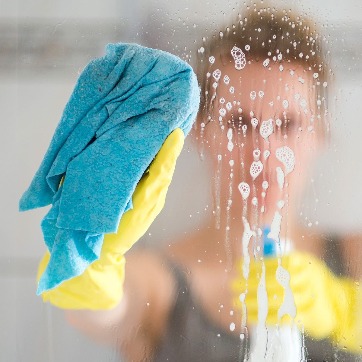 how-to-clean-a-glass-shower-door-get-rid-of-limescale-and-watermarks