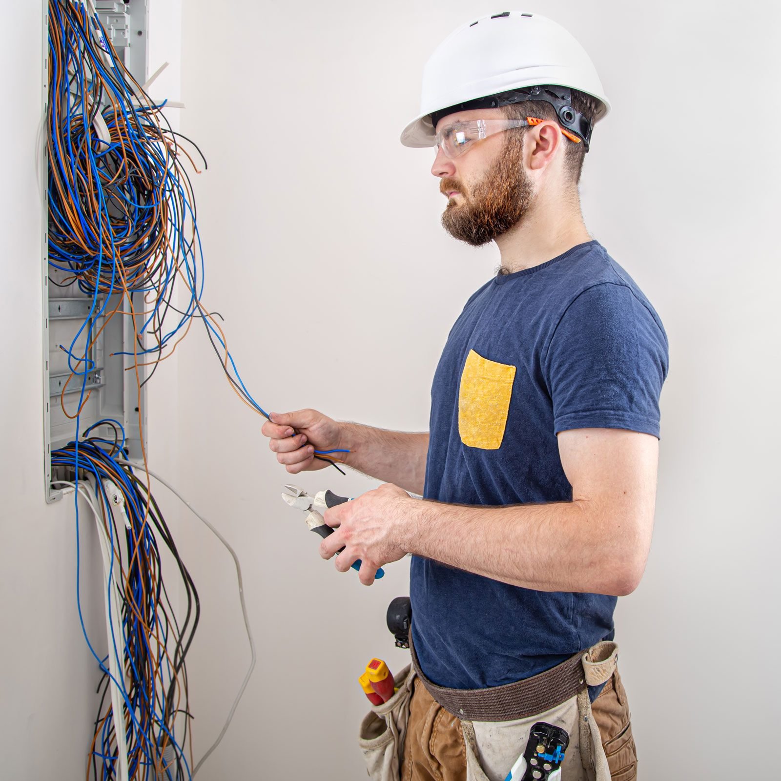 How Much Does It Cost To Hire an Electrician vs. DIY?