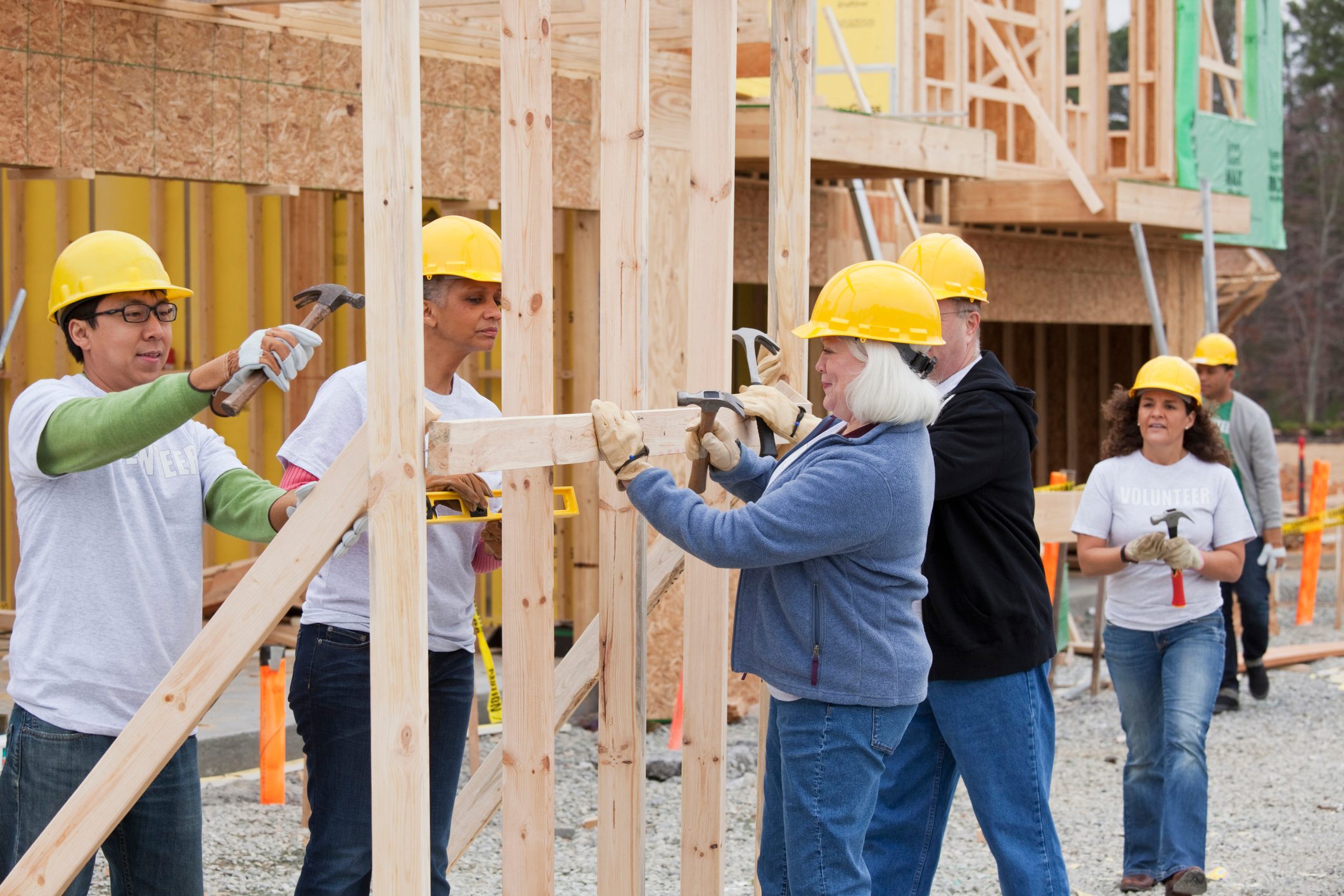 Volunteers working on construction site