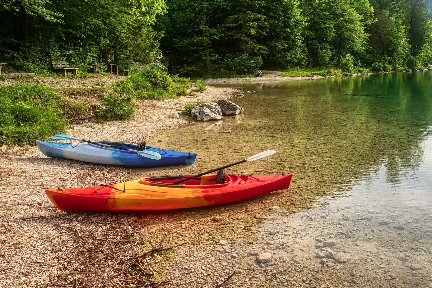 Canoe in mountain lake, summer landscape