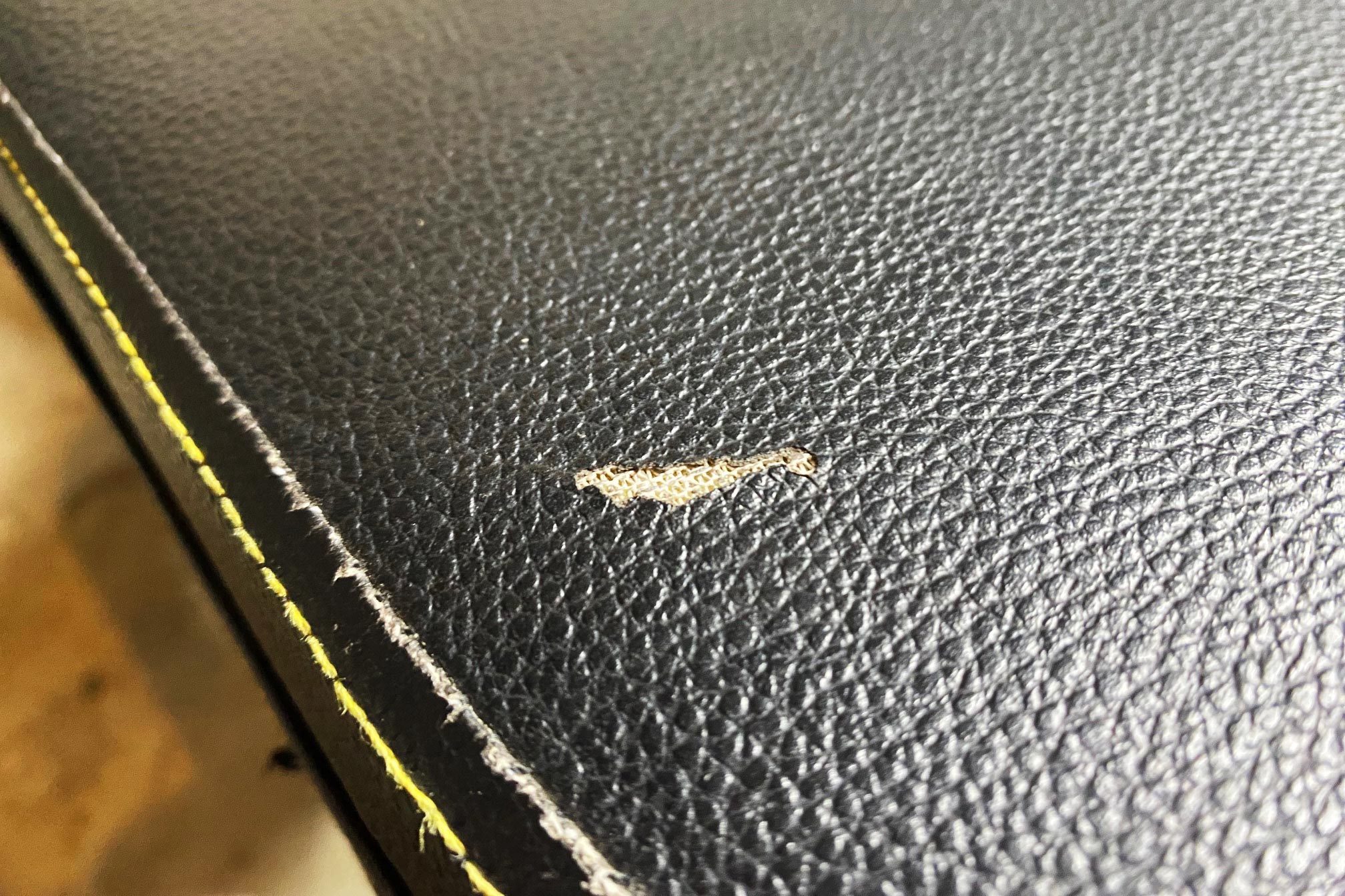 Tear in vinyl part of leather seat - Anyway to know what that