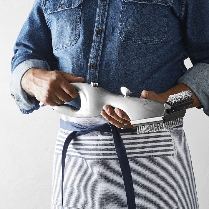 The Grill Daddy cleaning brush uses steam to melt away stuck-on food