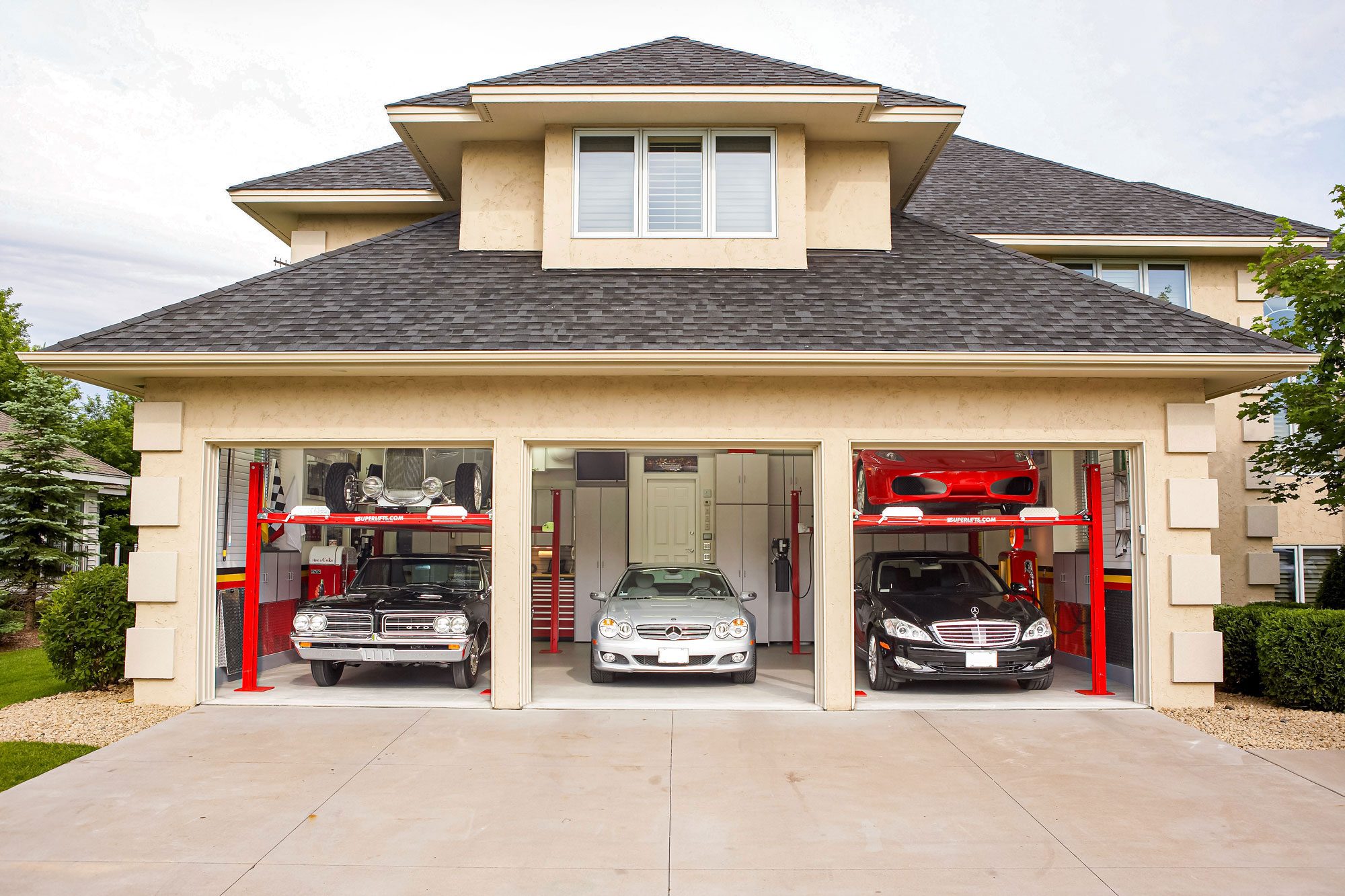 How Do You Fit Five Cars into a Three-Car Garage?