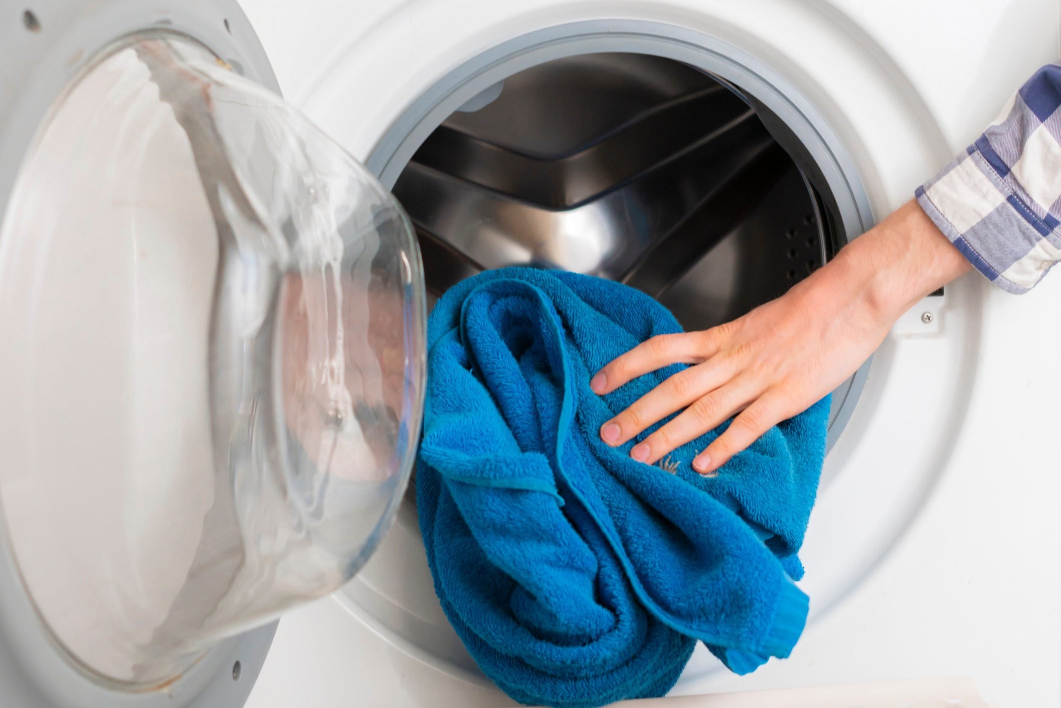 Should You Put a Dry Towel in Your Dryer?