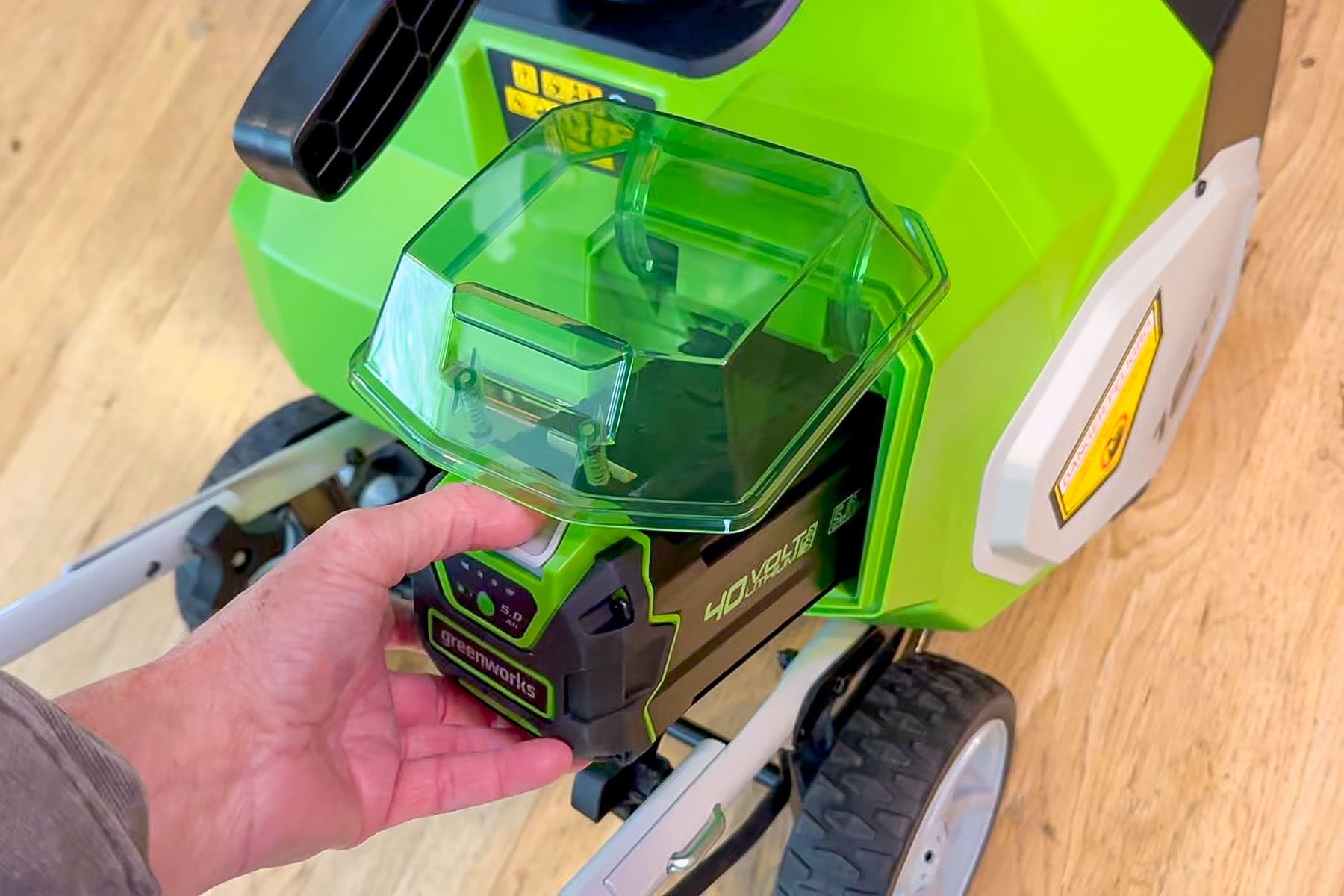 Inserting Battery into Greenworks Cordless Snow Blower