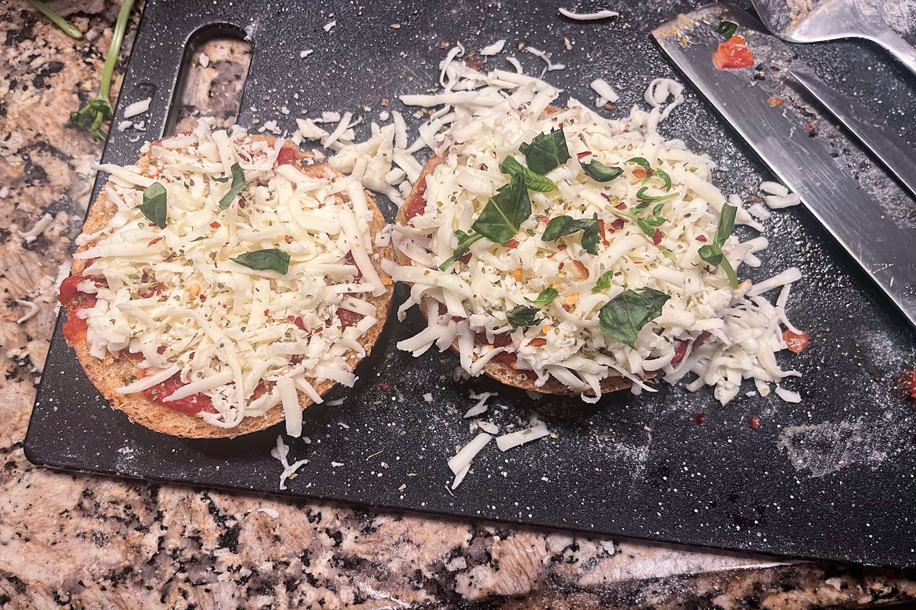 Uncooked Pizza Bagels ready to be baked