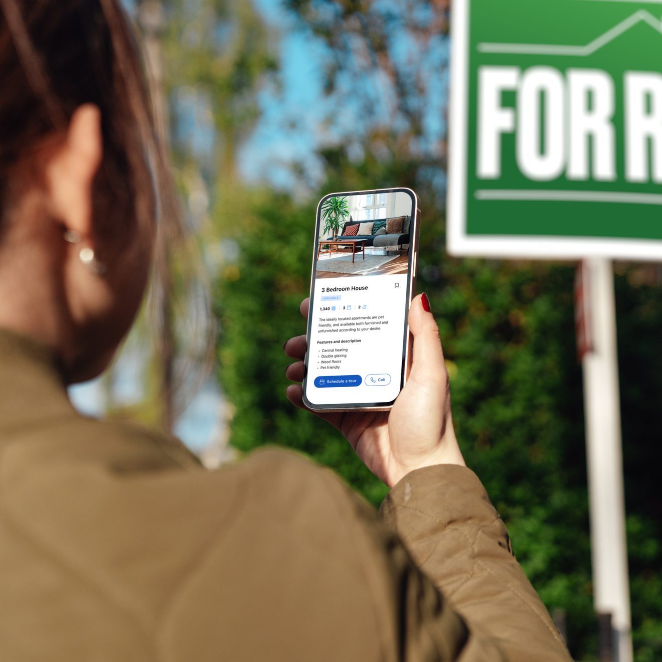 Woman looking for property to rent via real estate online platform on smartphone