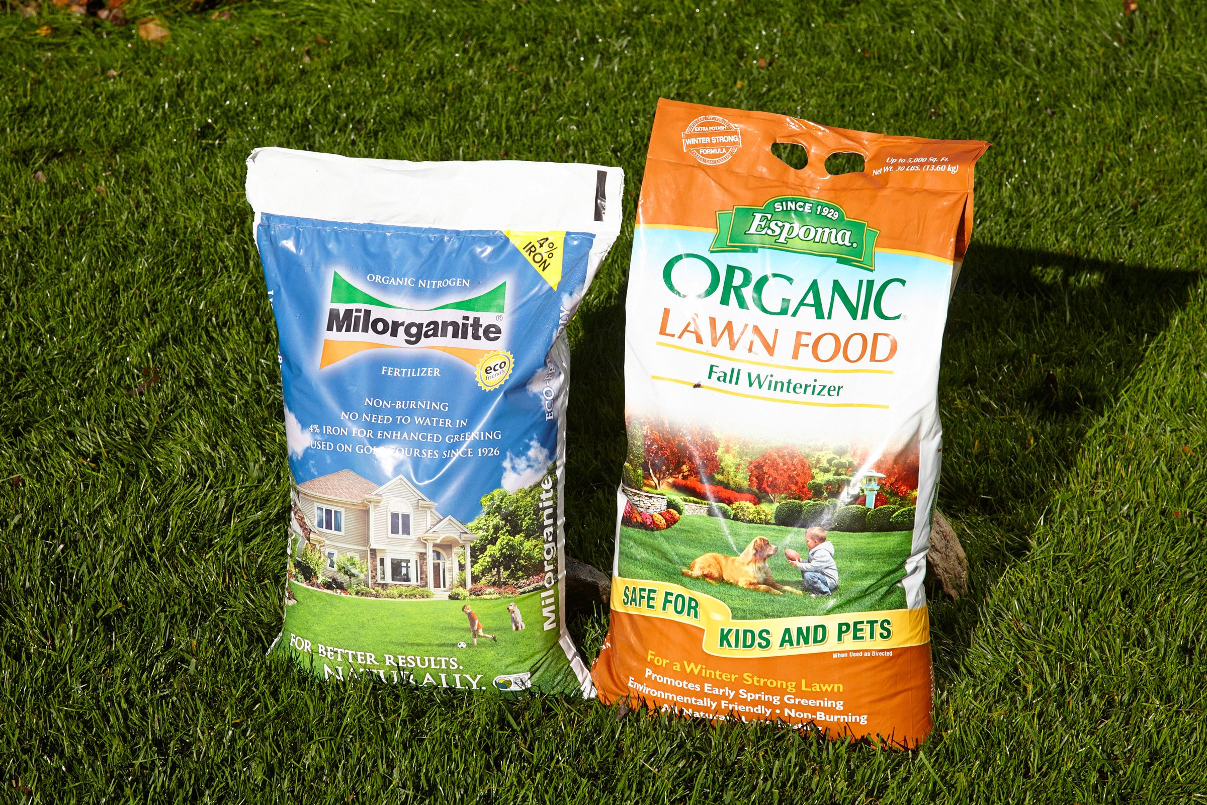 two bags of soil in the grass