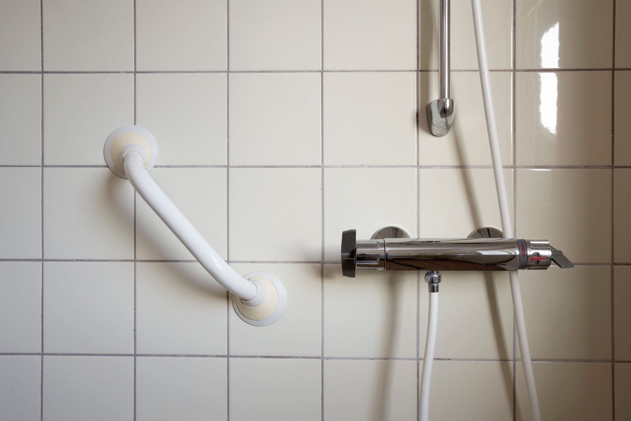 Shower and handrail,grab bar for elderly people at the bathroom in hospital or retirement home , safty and medical concept