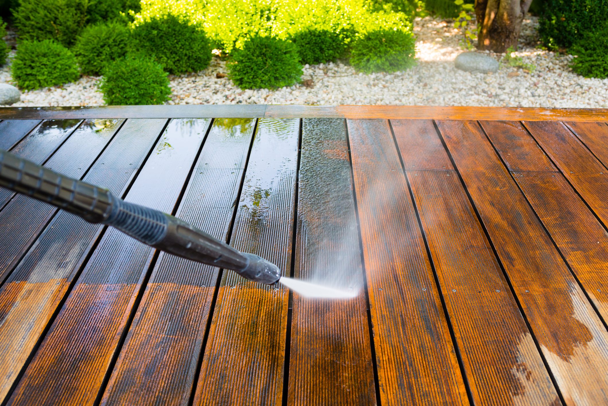 cleaning terrace with a pressure washer