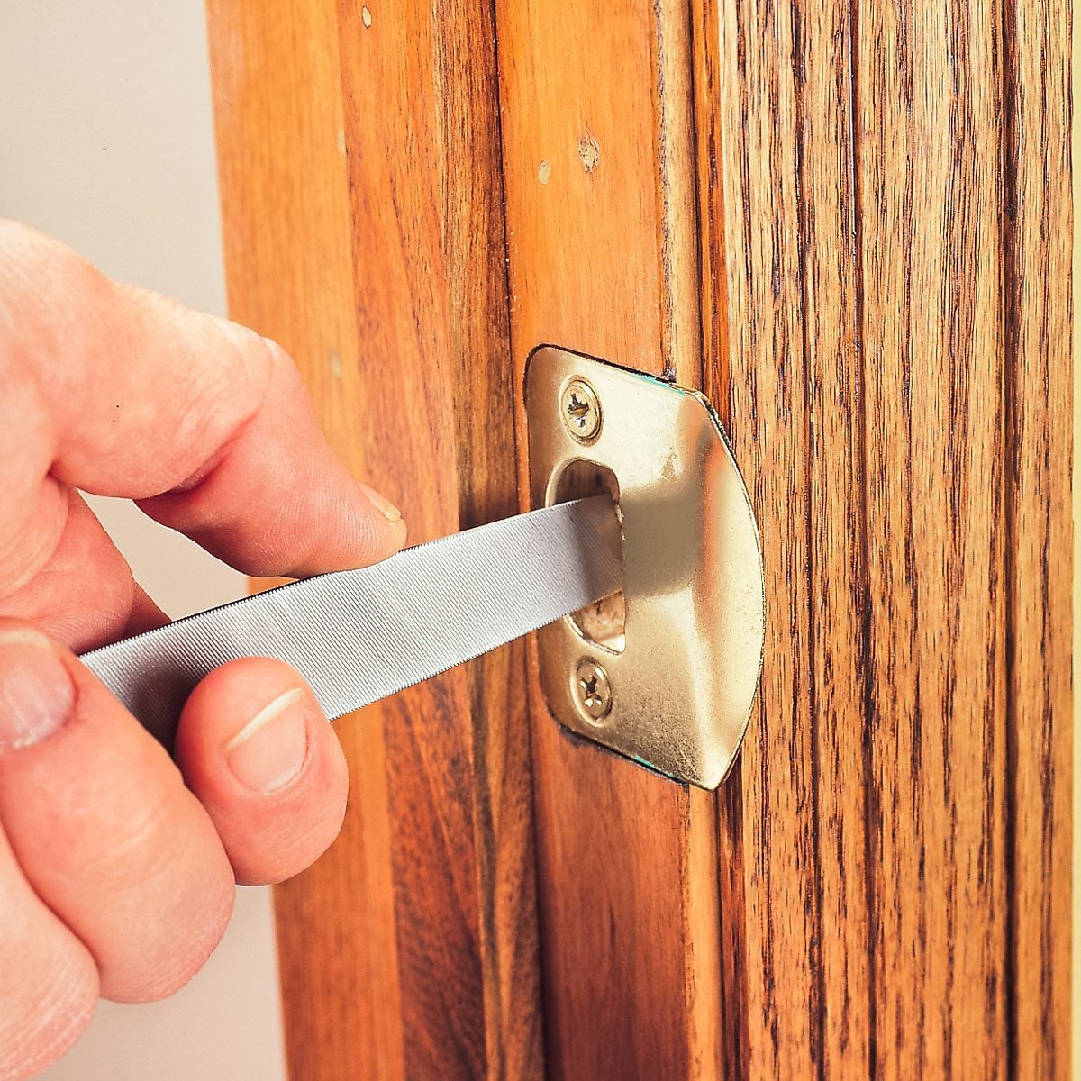 Adjusting A Door Striker Plate