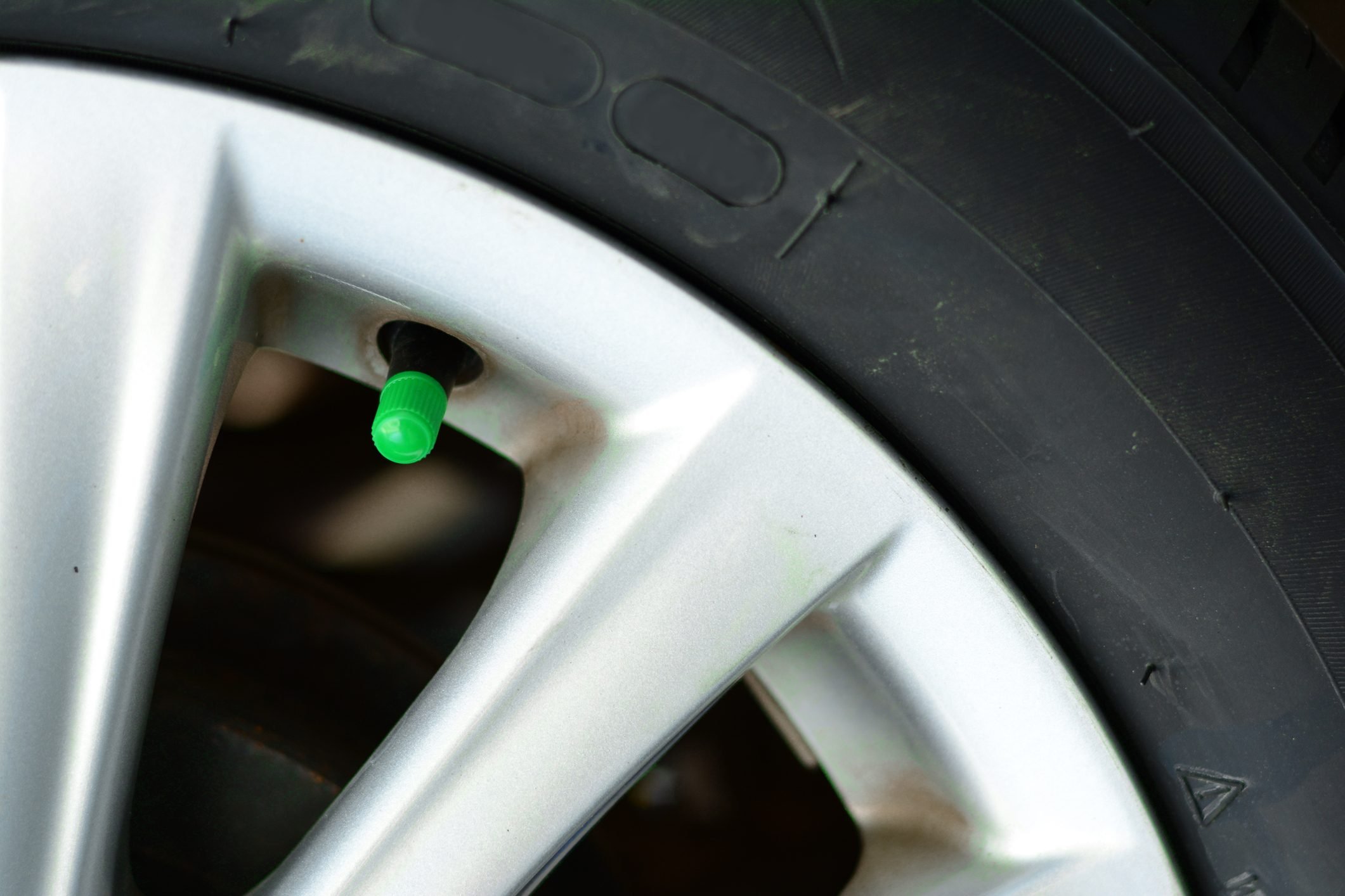 If You See a Green Cap on Your Tire Valve, This Is What It Means