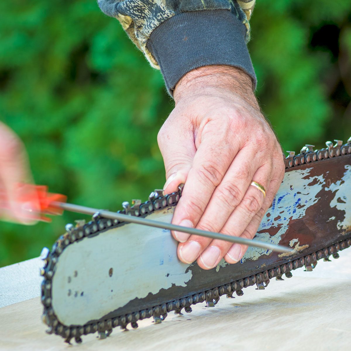Sharpening A Chainsaw Using Round File