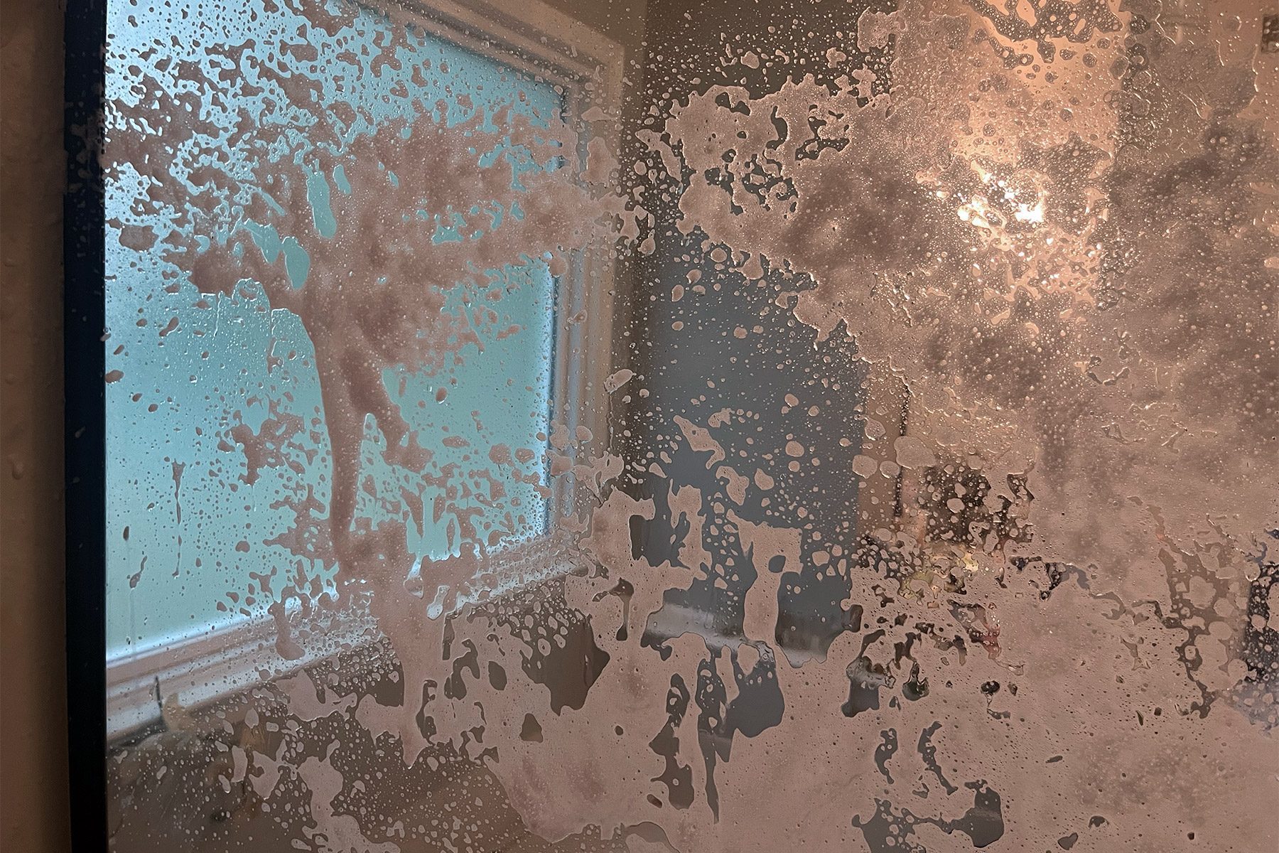 Foam cleaner on glass window