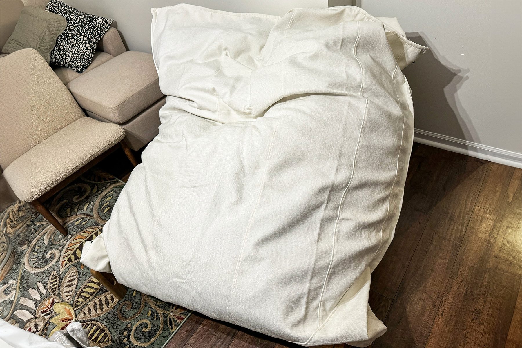 Lovesac Pillowsac on wooden floor