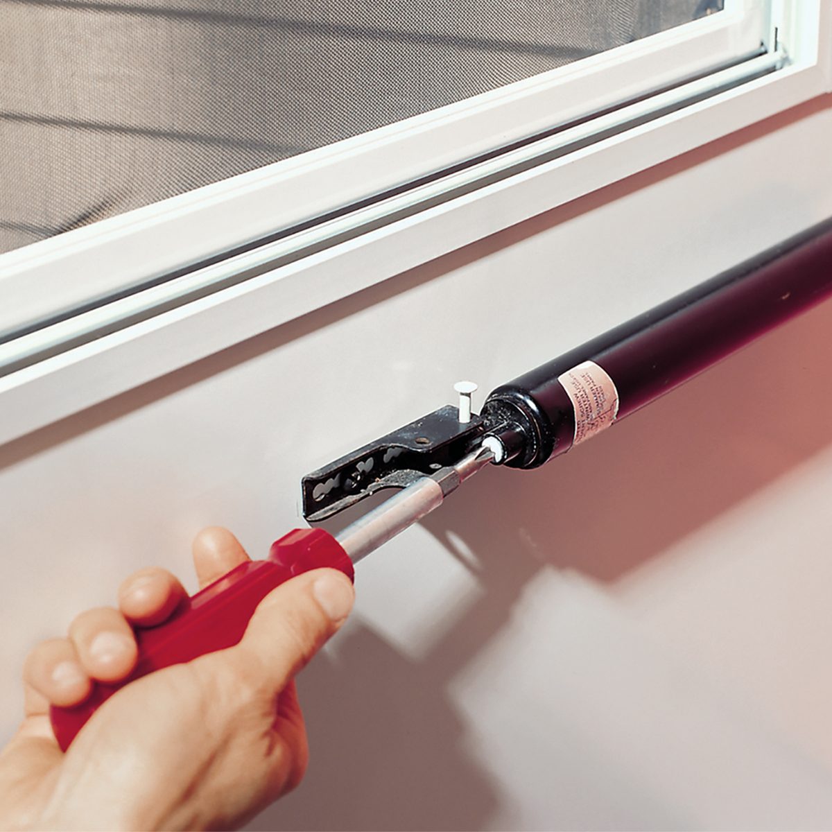 Here’s Why Your Storm Door Closer Has Two Screw Holes